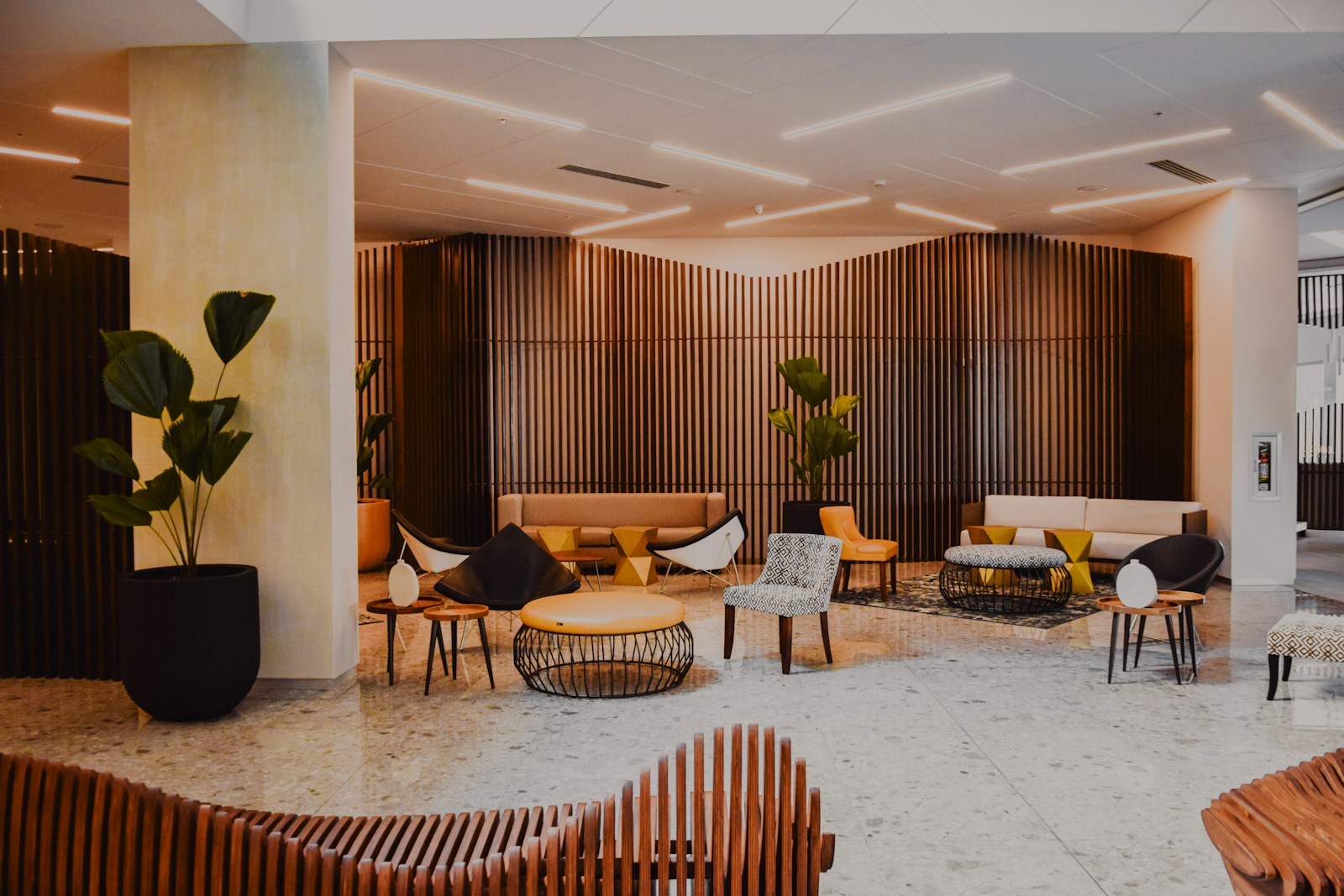 Hotel common area with inviting seating and architectural finishes