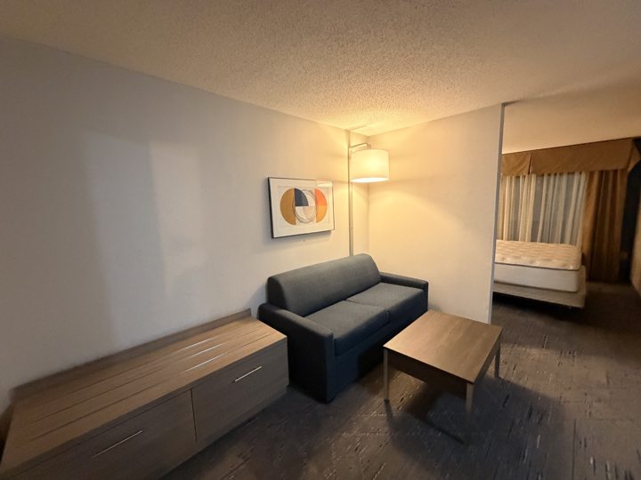 Suite seating area with a sofa and coffee table